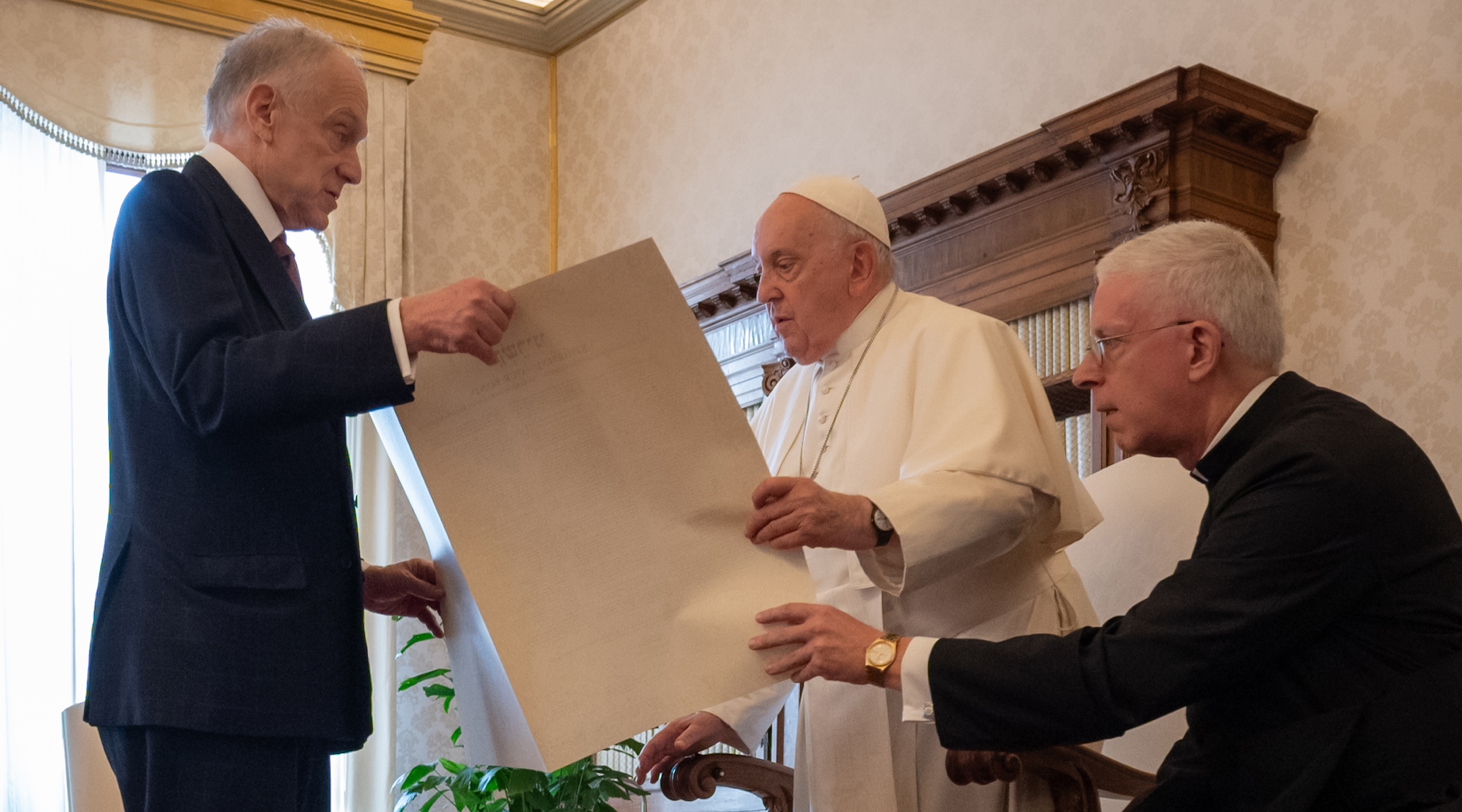 World Jewish Congress President Ronald Lauder gives Pope Francis the “Kishreinu” (Hebrew for “Our Bond”) document acknowledging the influence of the Catholic Church’s 58-year-old Nostra Aetate declaration on Catholic-Jewish relations, Oct. 19, 2023. (Shahar Azran/WJC)