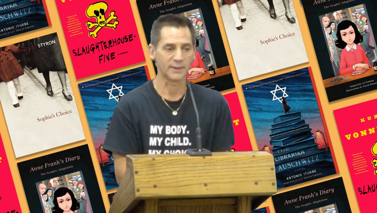 Bruce Friedman, a Jewish father in Clay County, Florida, has successfully pushed his public school to remove “Anne Frank’s Diary: The Graphic Adaptation” and has challenged thousands of other books. (Screenshot via YouTube/ Design by Mollie Suss)