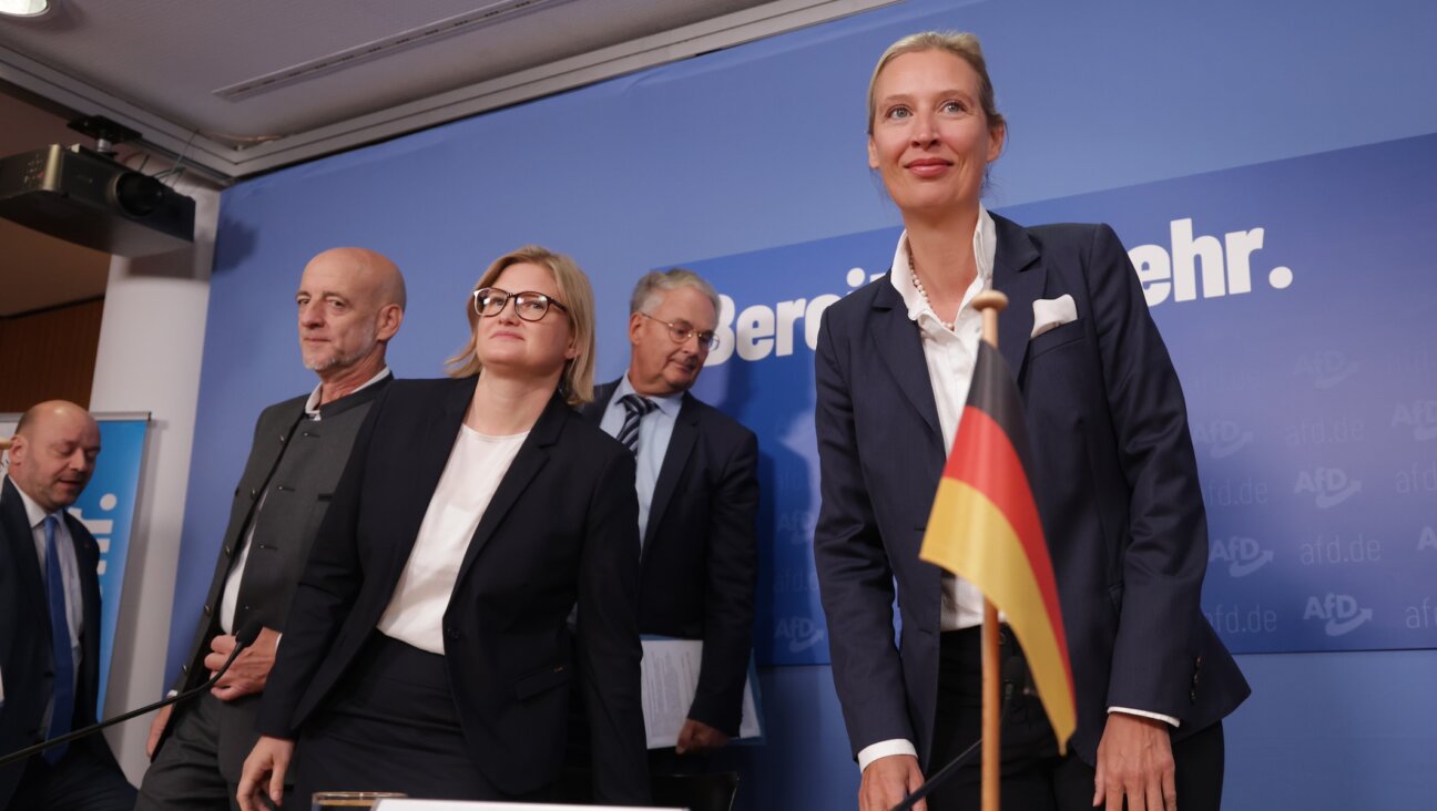 Alice Weidel, right, co-leader of the AfD party, arrives at a press conference in Berlin with party candidates from state elections, Oct. 9, 2023. (Sean Gallup/Getty Images)