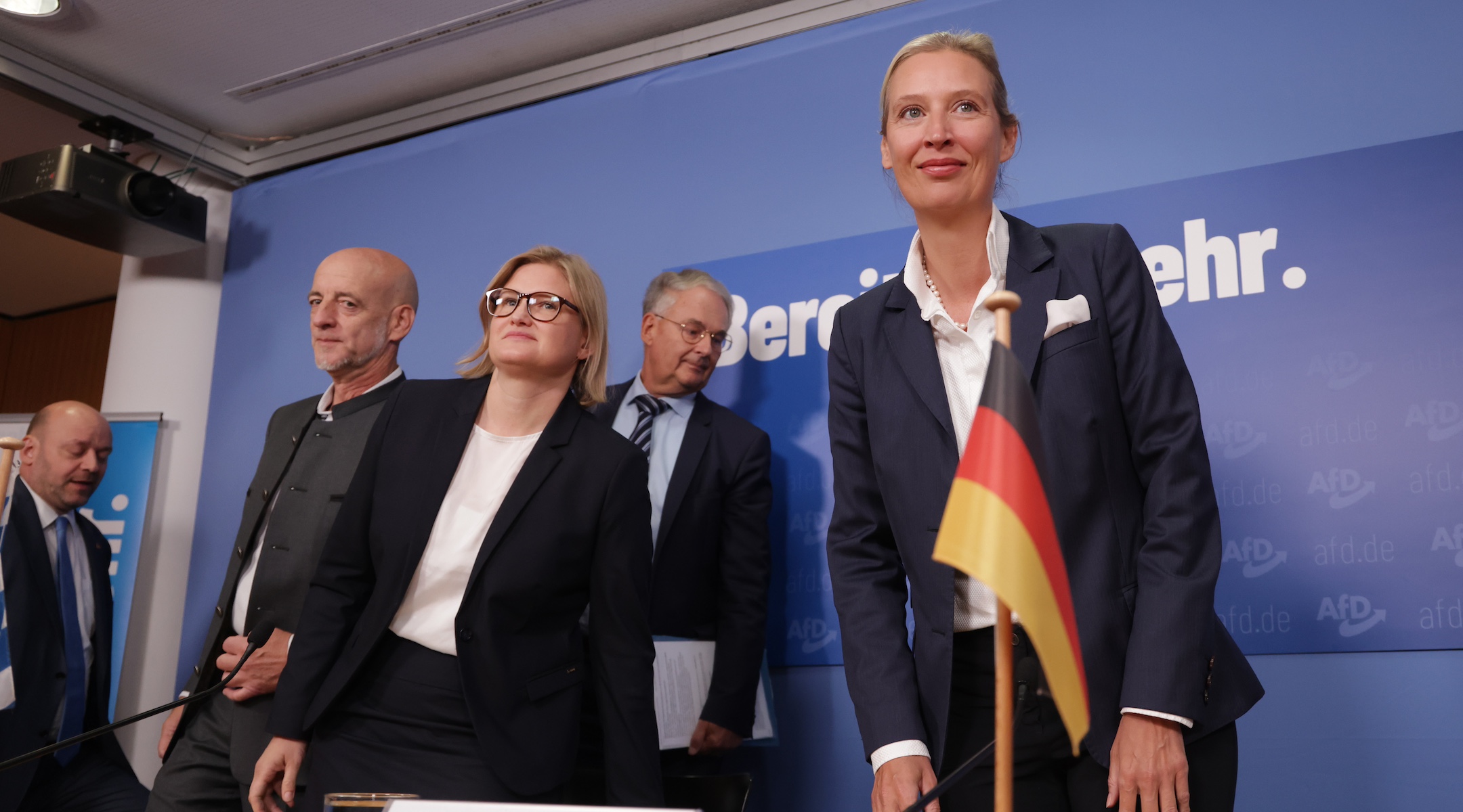 Alice Weidel, right, co-leader of the AfD party, arrives at a press conference in Berlin with party candidates from state elections, Oct. 9, 2023. (Sean Gallup/Getty Images)