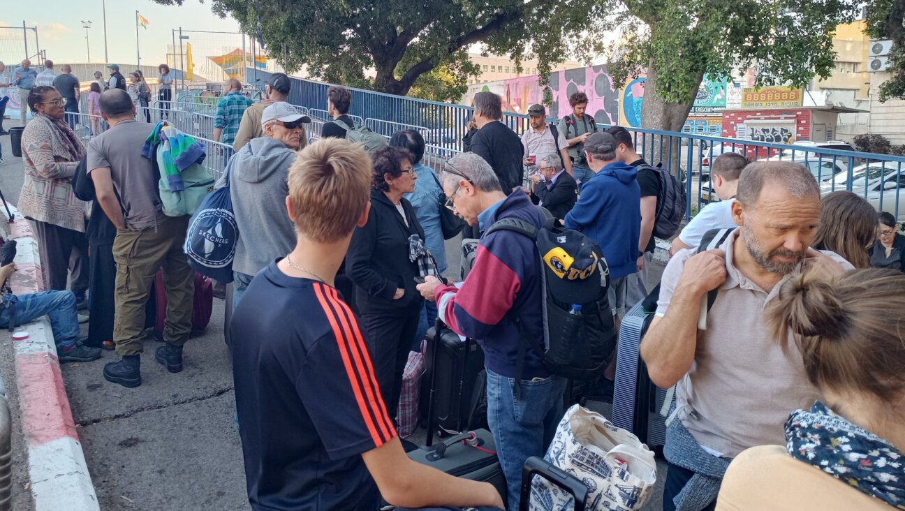 American citizens wait to board a boat from Haifa to Cyprus on Monday, Oct. 16, 2023. (Eliyahu Freedman)