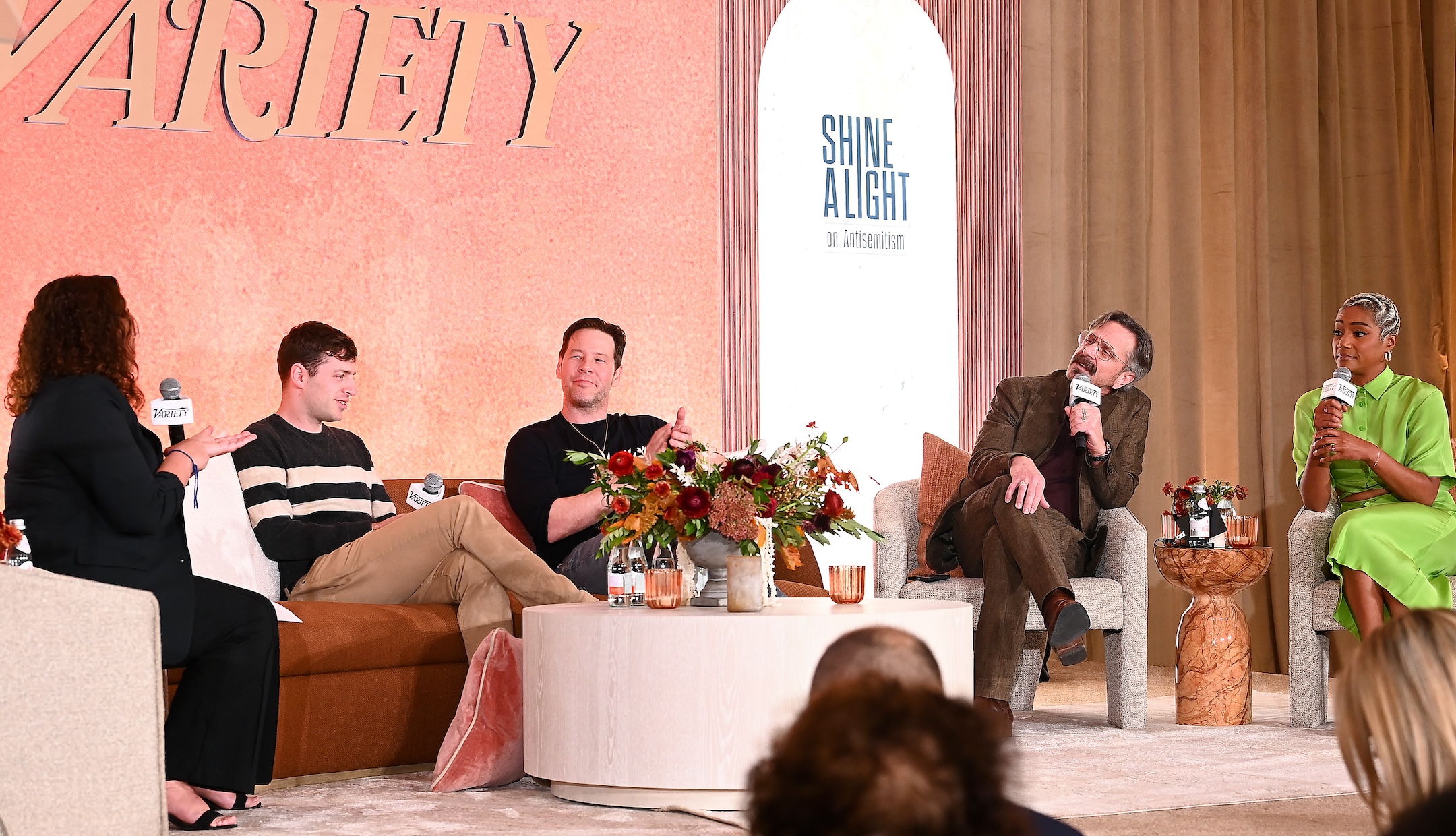 From left to right: Variety contributor Malina Saval, Alex Edelman, Ike Barinholtz, Marc Maron and Tiffany Haddish speak onstage during the Variety Hollywood & Antisemitism Summit in West Hollywood, California, Oct. 18, 2023. (Araya Doheny/Variety via Getty Images)