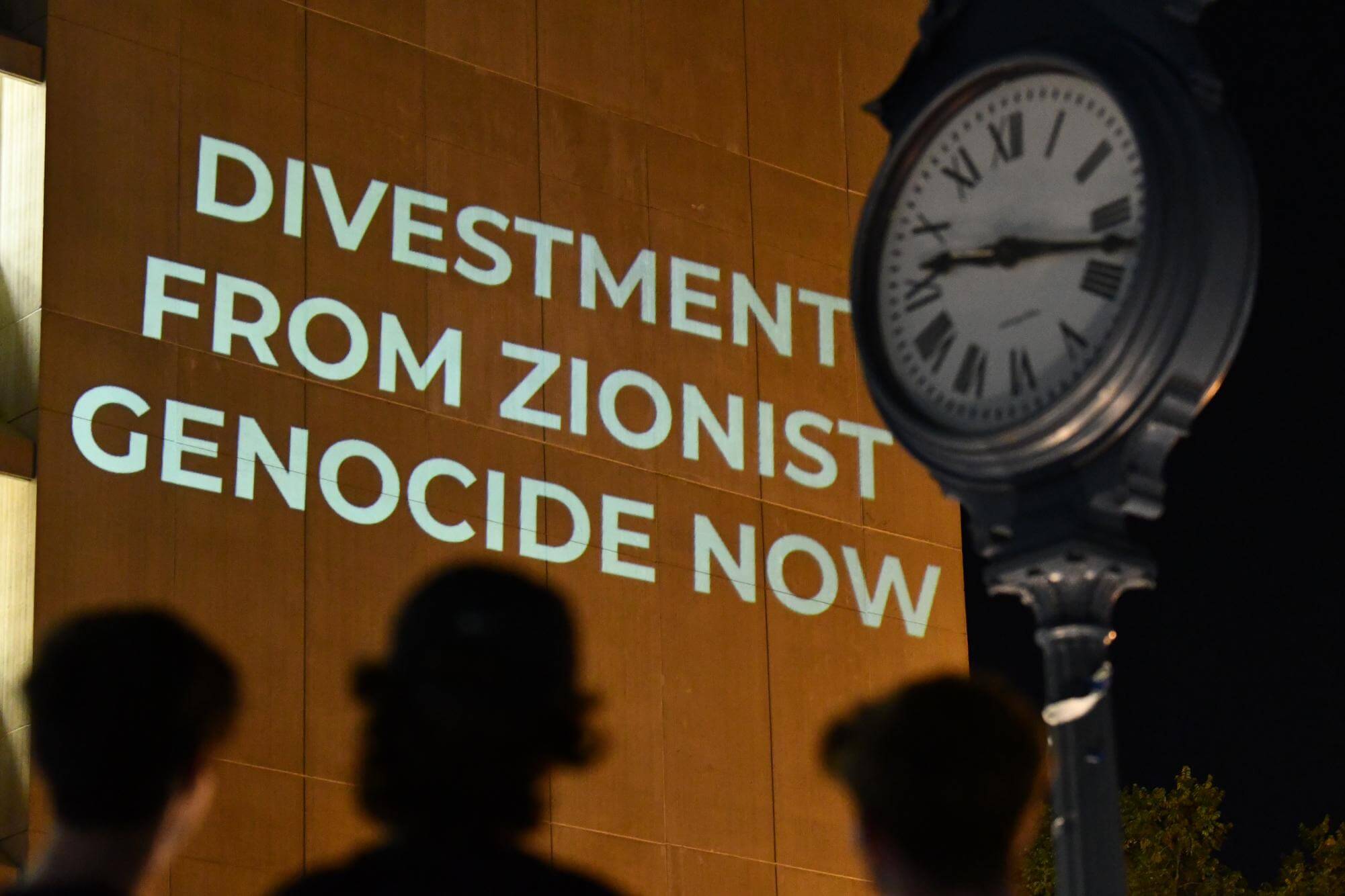 The facade of George Washington University's library was lit up with anti-Israel slogans. 