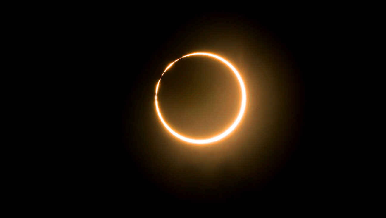 In an annular solar eclipse, the sun's light is not entirely blocked by the moon, and a "ring of fire" is visible.