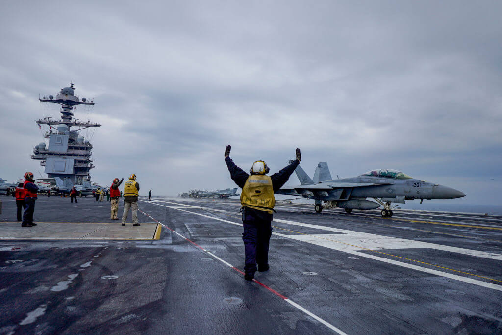 A fighter jet lands on the US aircraft carrier USS Gerald R. Ford in the North Sea off Denmark on May 22, 2023.
