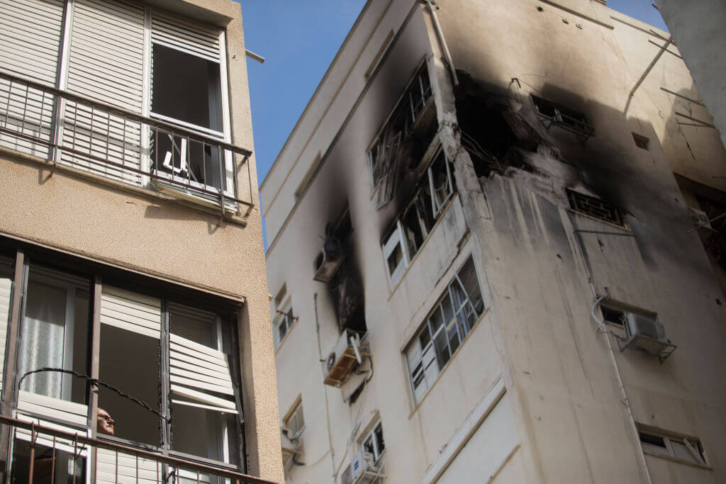 A building in Tel Aviv hit by a missile Oct. 7.