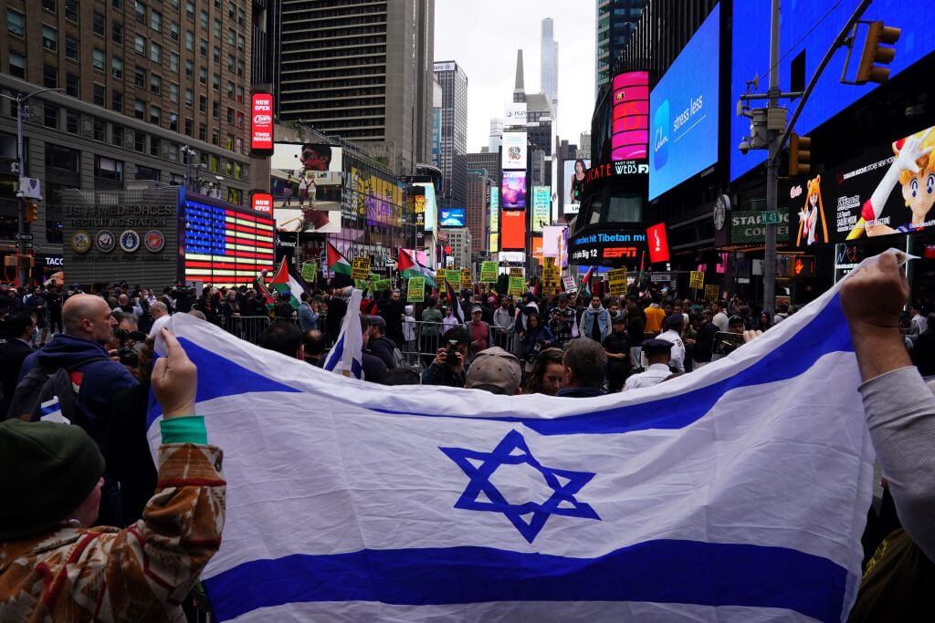 Supporters of Israel face people rallying in support of Palestinians in New York's Times Square on October 8, 2023.