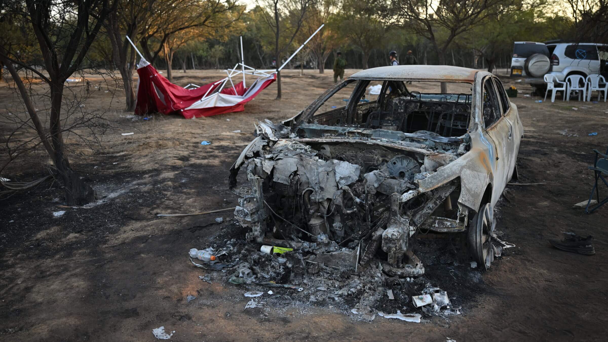 Burnt out cars at the Supernova Music Festival that was attacked by Hamas.