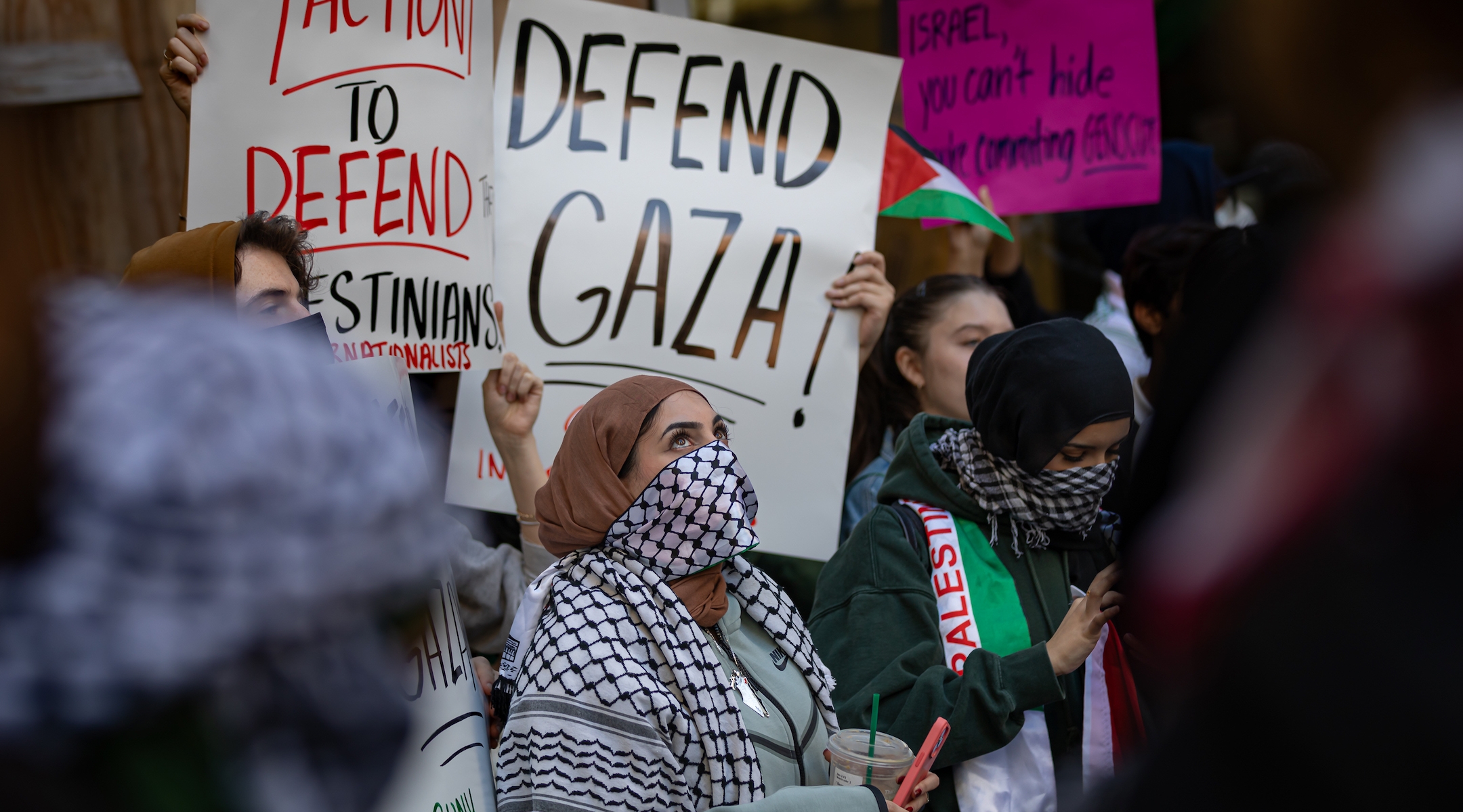 Students from Hunter College in New York City chant and hold up signs during a pro-Palestinian demonstration at the entrance of their campus on Oct. 12, 2023.(Michael Nigro/Pacific Press/LightRocket via Getty Images)