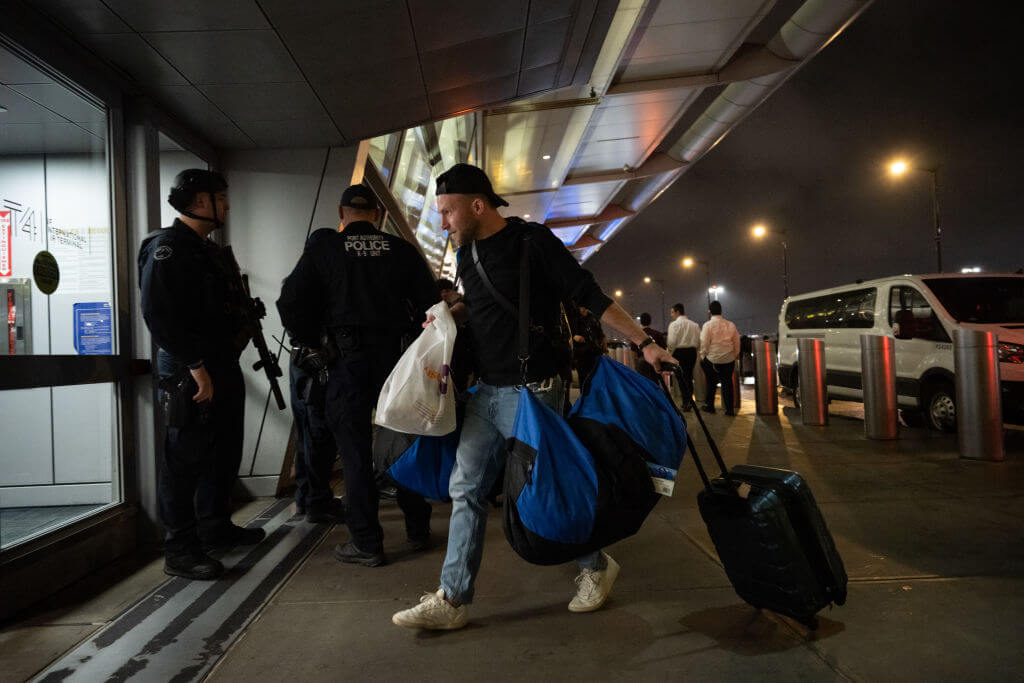 Al Friedman, 26, walks into JFK Airport  before flying to Tel Aviv to deliver supplies on October 14, 2023.