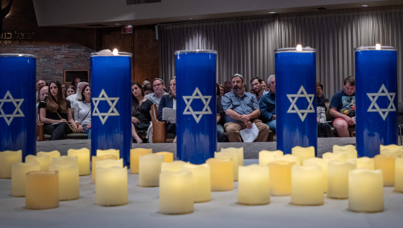 People attend a Sunday evening vigil amid the Israel-Hamas conflict at the Stephen Wise Temple  in Los Angeles, California.