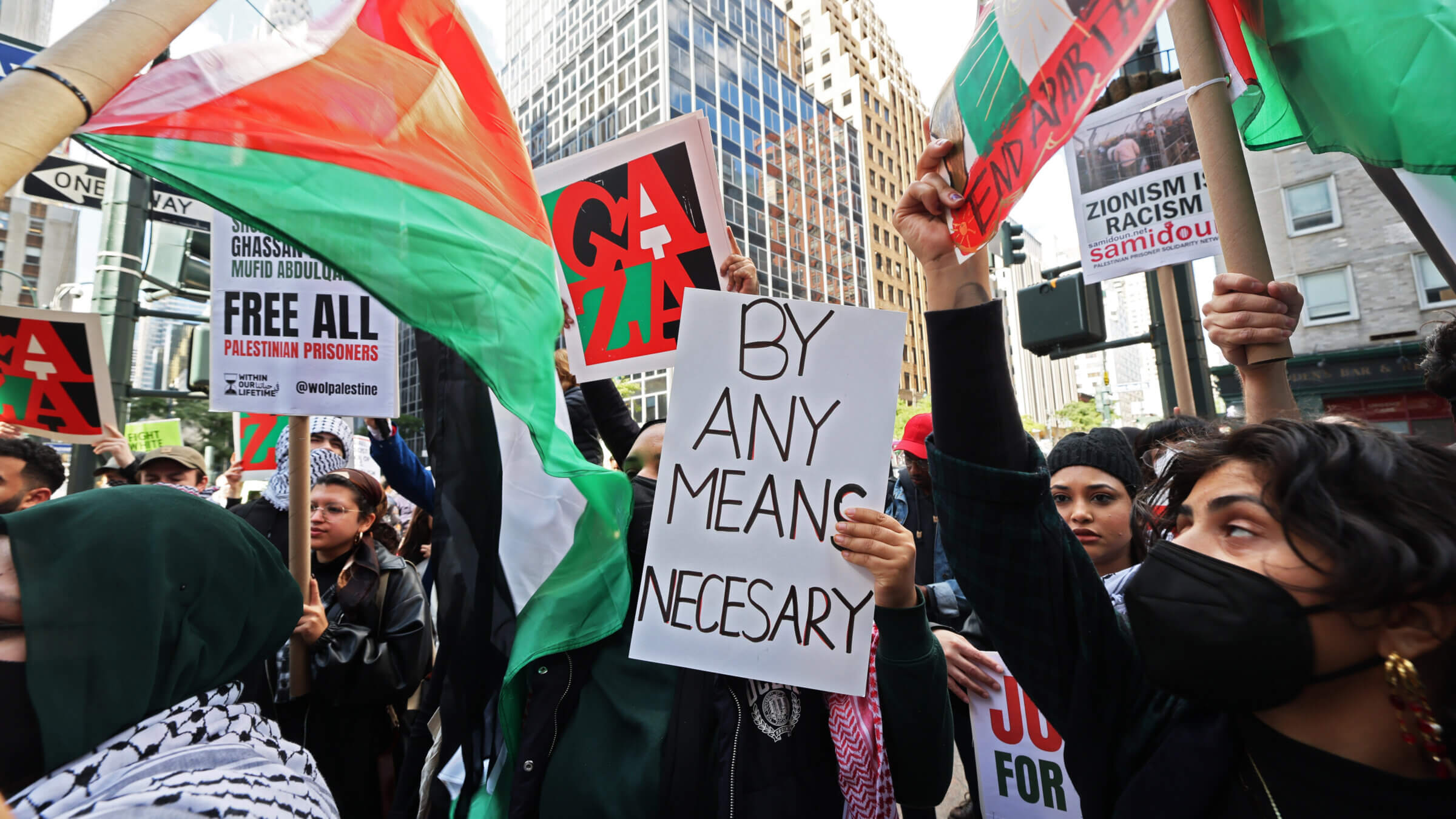 Demonstrators gather during the Emergency Rally for Gaza at the Consulate General of Israel Monday in New York City. Several Jewish organizations sponsored the event, which celebrated Saturday's attack by Hamas militants in Israel.