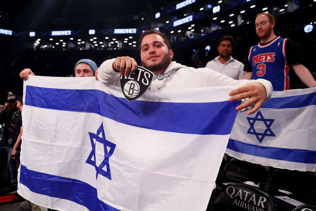 Fans show support for Israel prior to the start of an exhibition game between the Brooklyn Nets and Maccabi Ra'anana at Barclays Center on October 12, 2023 in New York City.