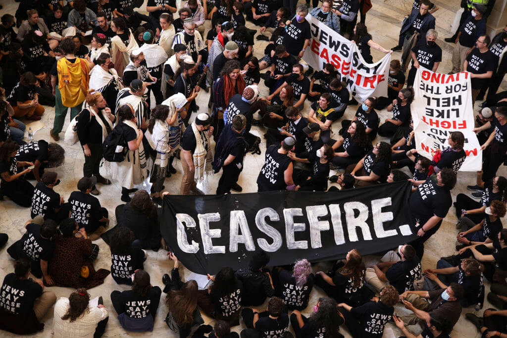 Protesters stage a demonstration in support of a cease fire against the Palestinians in Gaza in the Cannon House Office Building on October 18, 2023 in Washington, DC. 