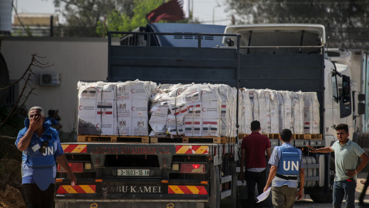 The entry of humanitarian aid arrives through the Rafah land crossing into the Gaza Strip on October 21, 2023 in Rafah, Gaza. 