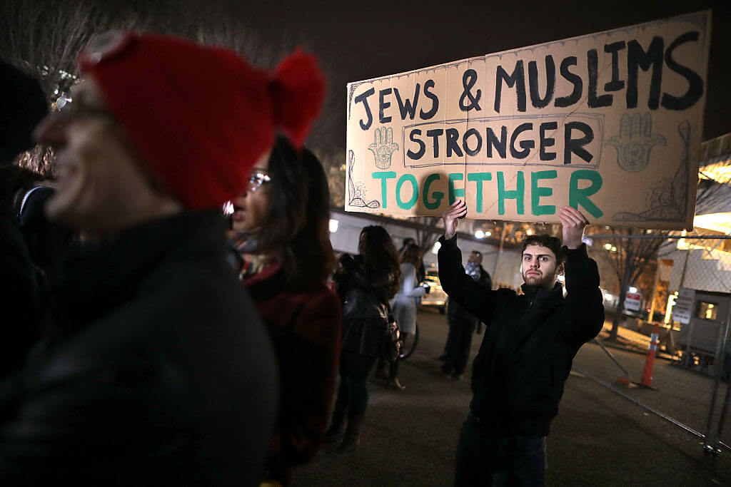 Demonstrators outside the White House protesting the proposed immigration ban by former President Donald Trump in 2016.
