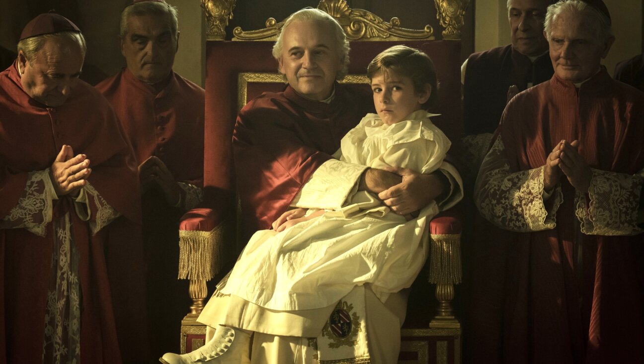 Paolo Pierobon as Pope Pius IX and Enea Sala as Edgardo Mortara in <i>Kidnapped</i>.
