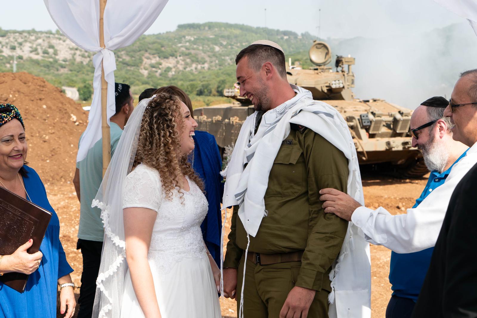 Shirel Tayeb and Reuven Lebetkin are married at Israel’s northern border on Oct. 23, 2023. Their planned wedding date took place during the Israel-Hamas war and they chose to move forward with changes. (Courtesy of Lebetkin)