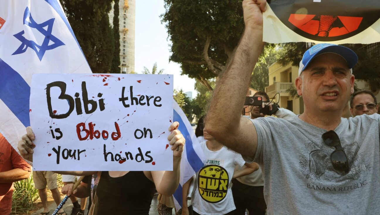 Supporters and family members of Israeli hostages snatched by the Palestinian militant group Hamas last week in a surprise attack into Israel, protest outside of the Israeli military base of Ha-Kirya in central Tel Aviv on October 14, 2023.