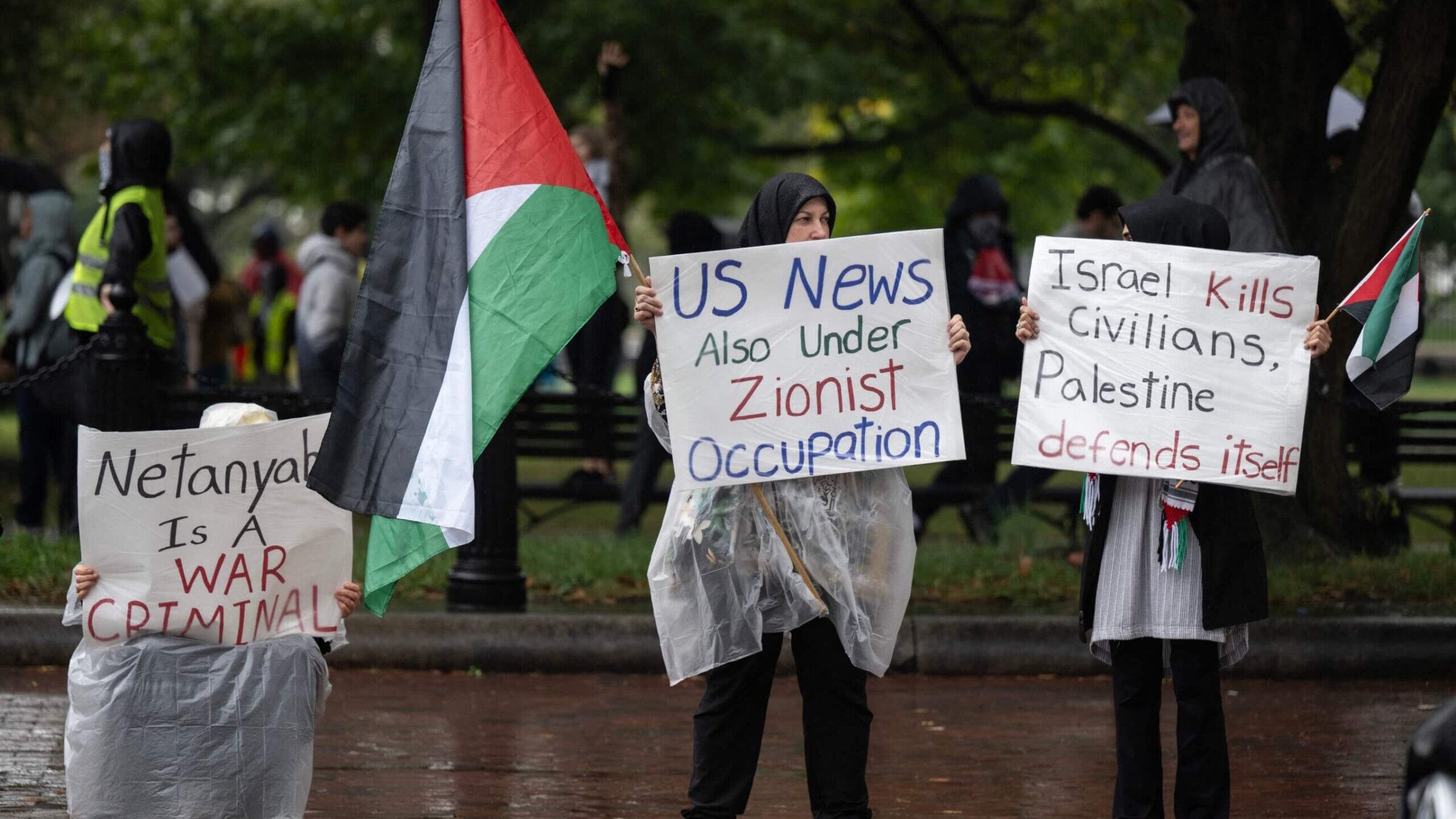 People demonstrate during a pro-Palestine rally at Lafayette Square in front of the White House in Washington, DC, on October 14, 2023. 