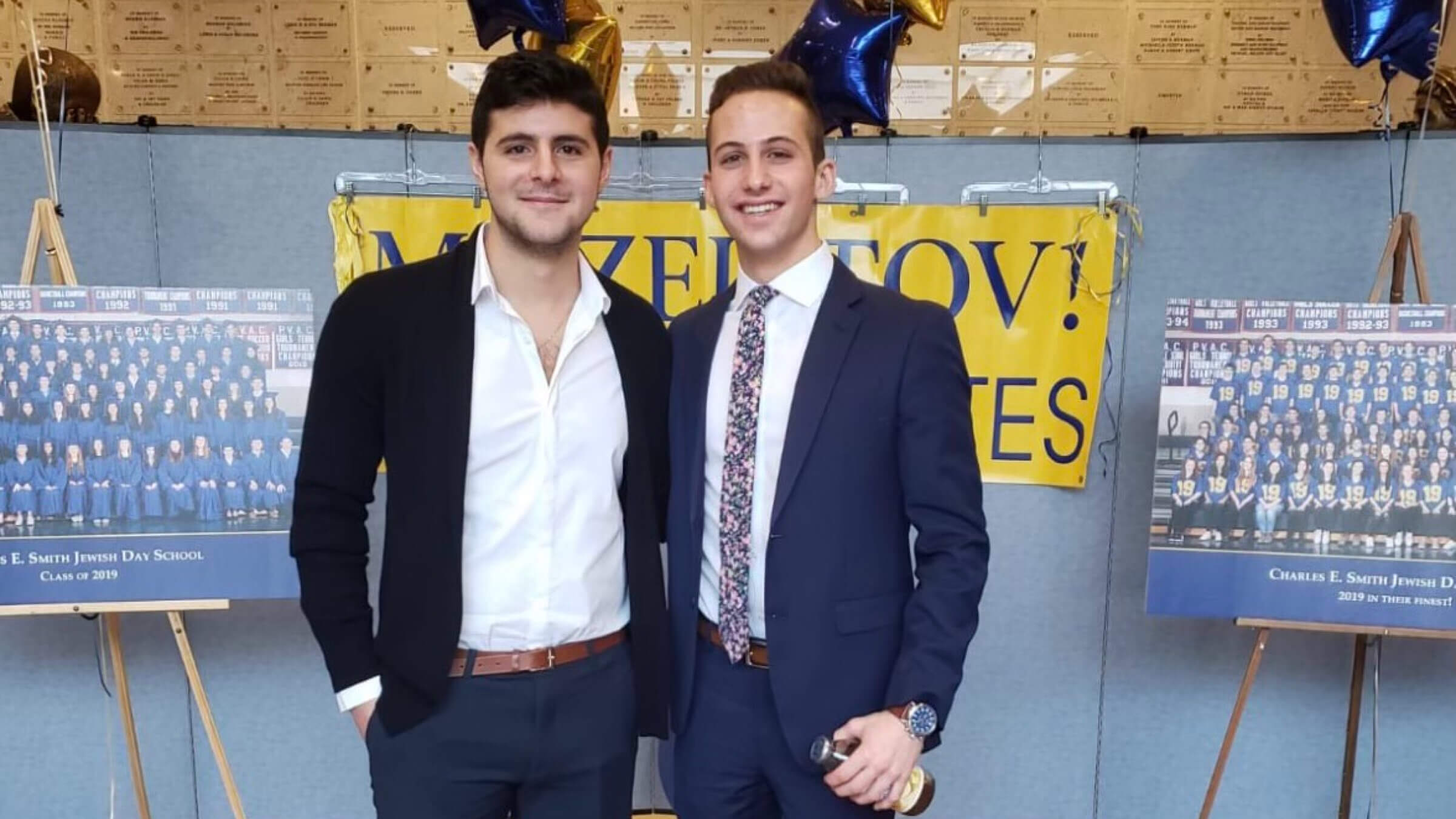 IDF reservist Omer Balva was killed in an anti-tank missile attack on Friday. He is pictured here with  his best friend, Ethan Missner, at their 2019 graduation from the Charles E. Smith Jewish Day School in Rockville, Maryland