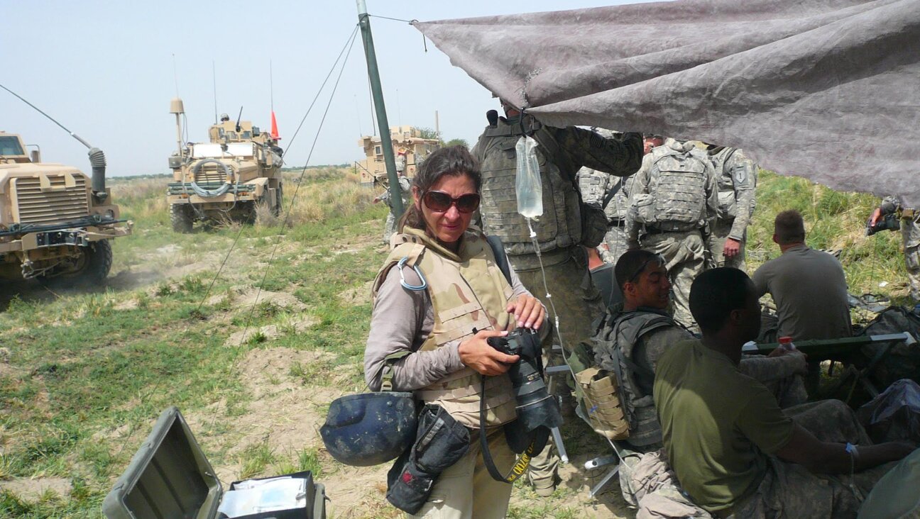 Photojournalist Lynsey Addario during an embed with the U.S. Marines in Helmand province, Afghanistan, April 2009.