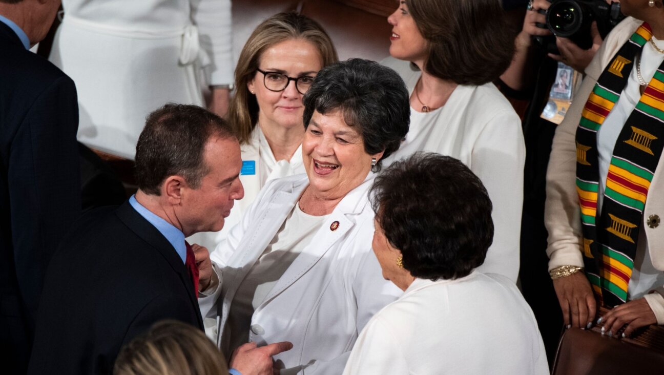 Rep. Lois Frankel, D-Fla. (center) joins colleagues on the floor of the House before President Donald Trump’s State of the Union address, Feb. 4, 2020. (Tom Williams/CQ-Roll Call, Inc via Getty Images)