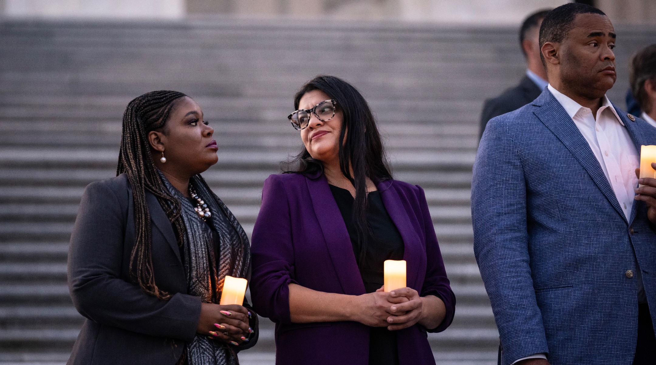 Reps. Cori Bush, a Missouri Democrat, and Rashida Tlaib, a Michigan Democrat, attend talk with each other as they attend a bipartisan candlelight vigil with members of Congress to commemorate one month since the Hamas terrorist attacks in Israel on October 7, at the U.S. Capitol, Nov. 7, 2023 (Drew Angerer/Getty Images)