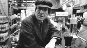 Leonard Cohen poses for a portrait in a diner in New York, circa 1968. (Roz Kelly/Michael Ochs Archives/Getty Images)