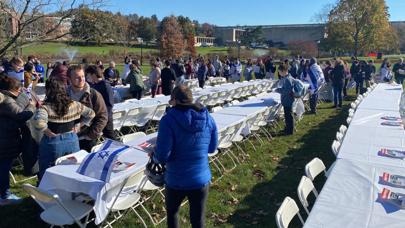 A demonstration for Israeli hostages staged by Hillel at the University of Massachusetts Amherst, shortly before a student was arrested for punching a Jewish student and spitting on an Israeli flag at the event in Amherst, Massachusetts, Nov. 3, 2023. (JTA)