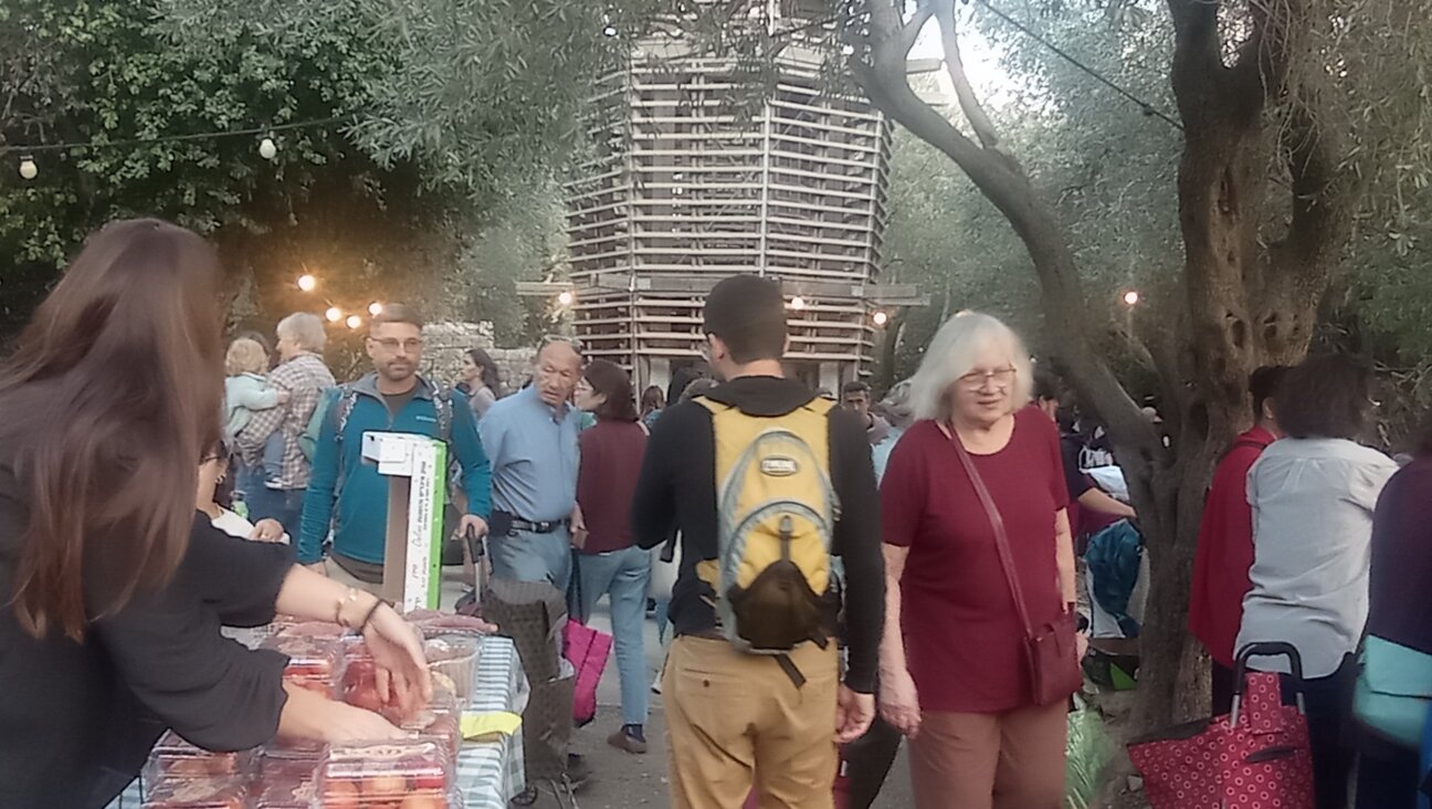 Jerusalemites packed a pre-Shabbat market aimed at supporting Israeli farmers near Gaza hard hit by the war.
