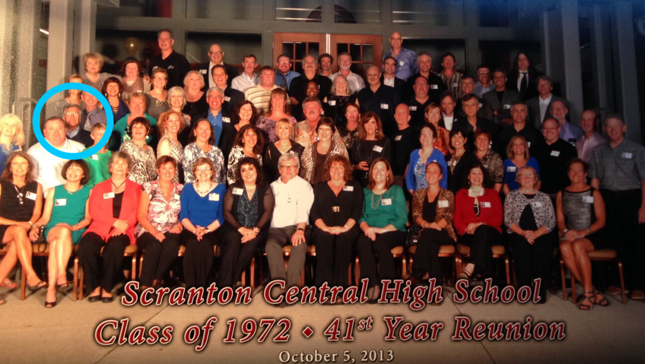 Paul Kessler, circled, in dark sweater, at a Scranton Central High School class reunion in 2013.