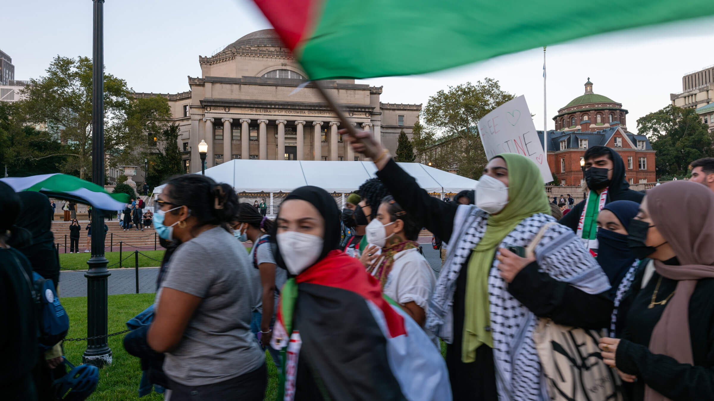 Columbia students participate in a rally at the university on October 12. The university banned two pro-Palestinian student clubs Friday, citing policy violations.