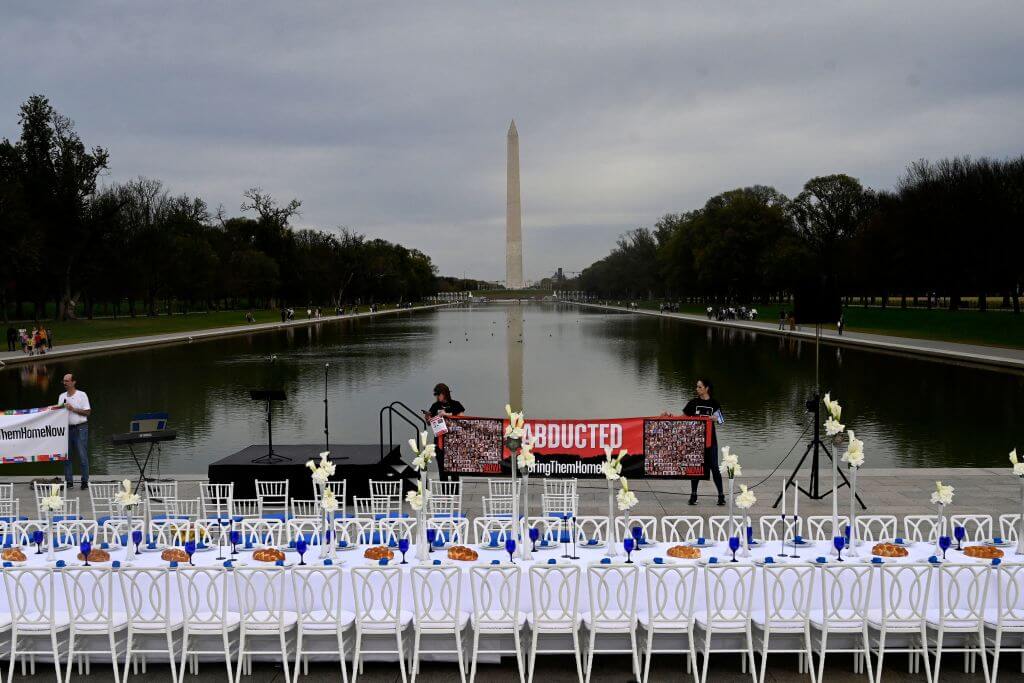 A Shabbat dinner table with 200 empty seats representing the Israeli hostages, at the Lincoln Memorial in Washington, DC, on October 27, 2023.