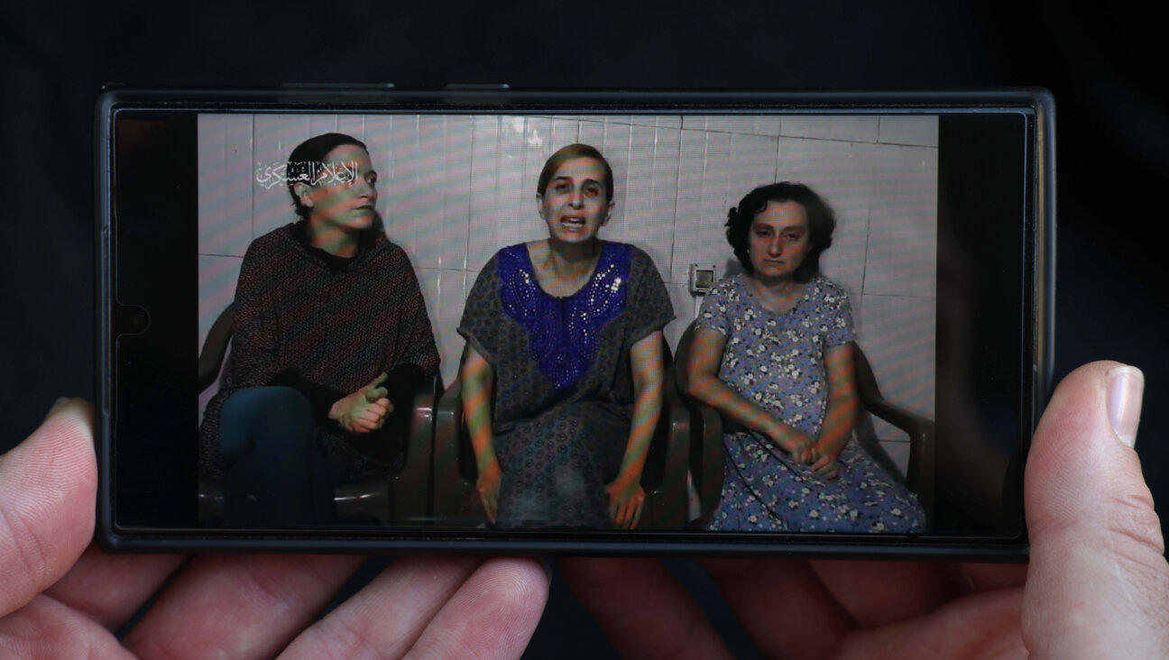 Danielle Aloni, center, also featured in a video released by Hamas during her captivity.