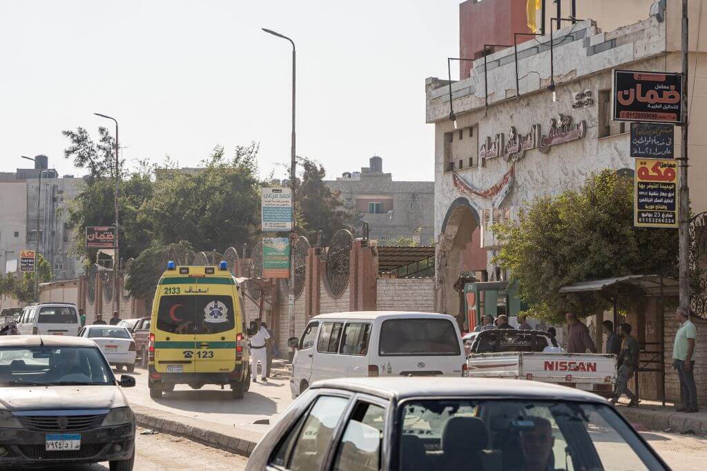 An ambulance with a patient from the Gaza Strip drives toward El Arish General Hospital on November 1, 2023 in El Arish, Egypt.