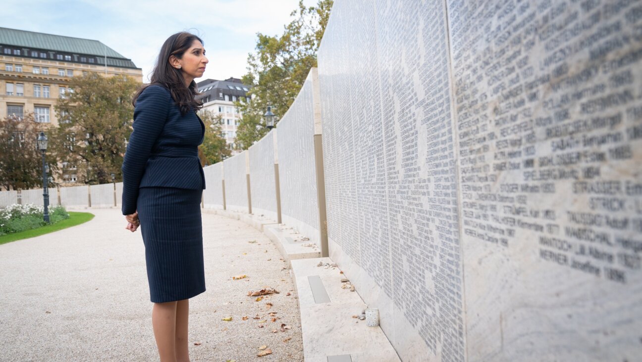 Suella Braverman visits the Shoah Wall in Ostarrichi Park, Vienna, which carries the names of 65,000 Jews from Austria who died in the Holocaust, Nov. 2, 2023. (Stefan Rousseau/PA Images via Getty Images)