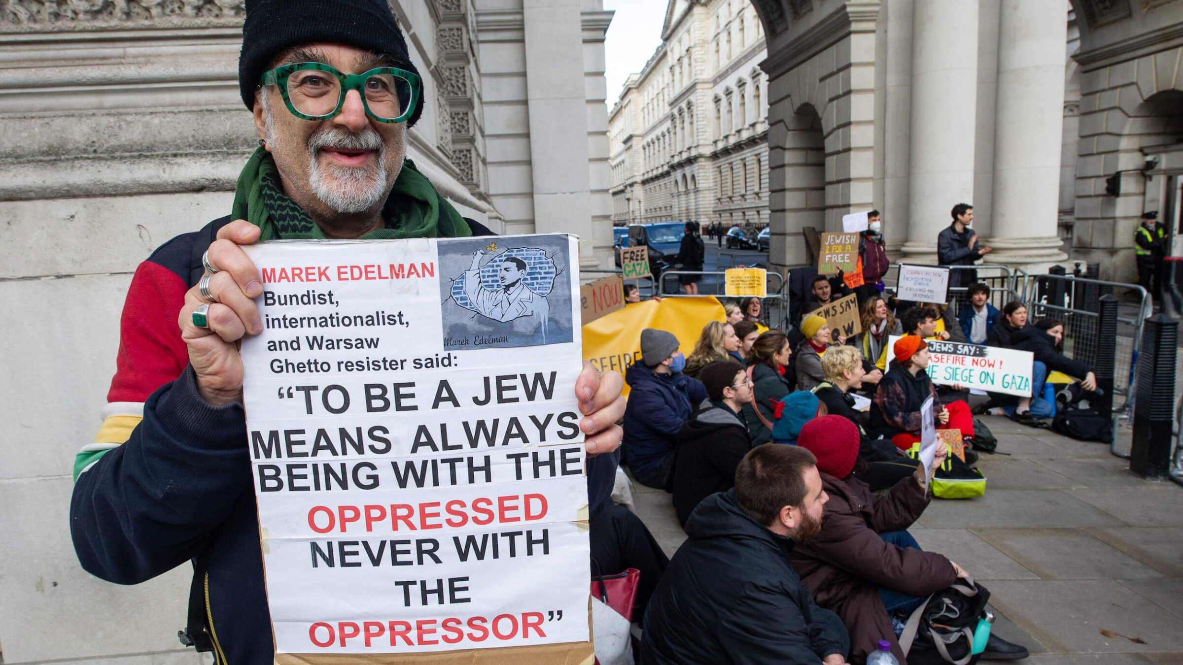 Activists from Na'amod, an organization of British Jews who oppose Israel's occupation of the West Bank, blocked walkways into a government building last week to demand a cease-fire in Gaza.