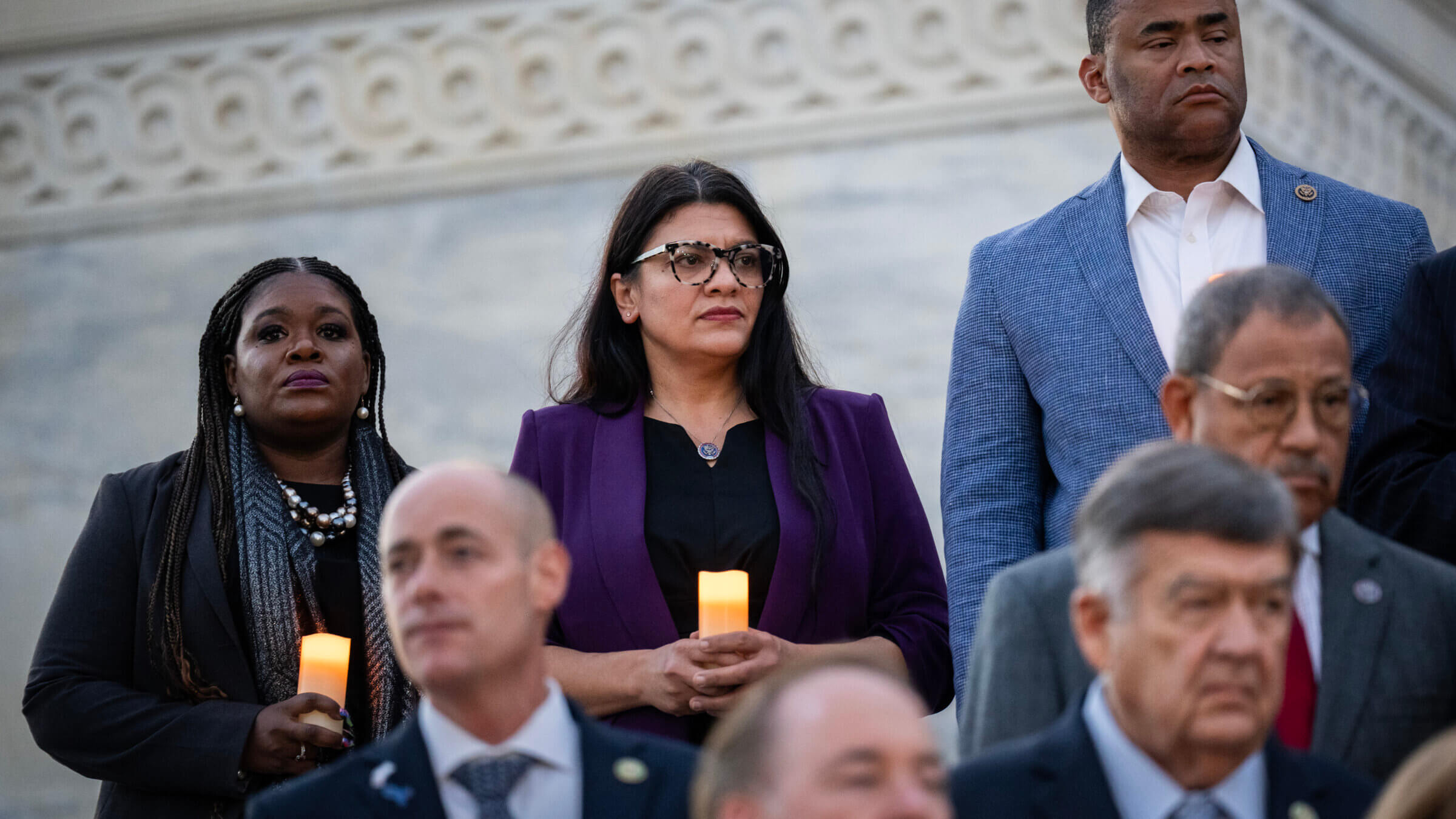 Rep. Rashida Tlaib (D-MI), center, attended a bipartisan candlelight vigil with members of Congress to commemorate one month since the Hamas terrorist attacks in Israel on Oct. 7 in Washington, DC