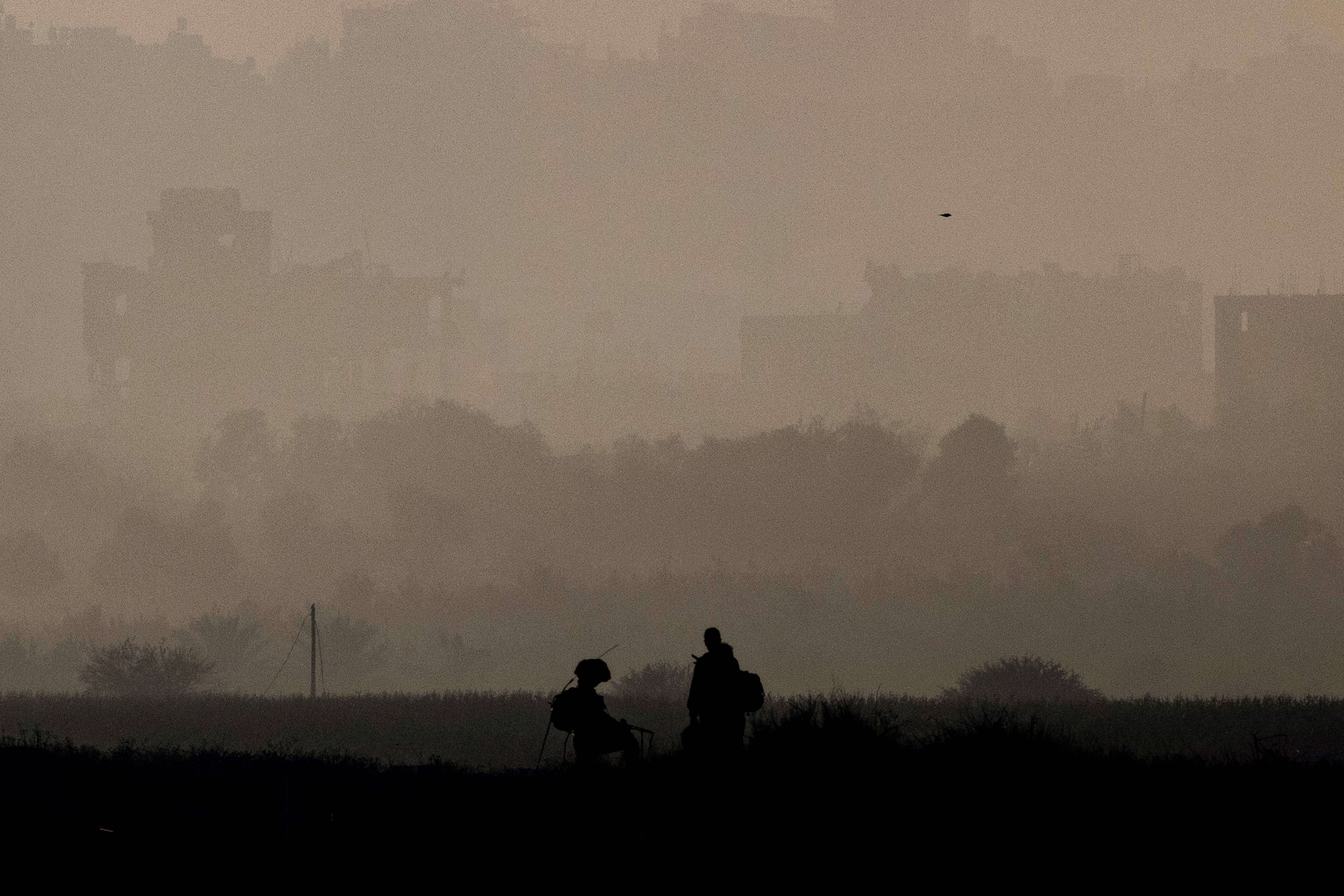 Israeli soldiers patrol near the border with the Gaza Strip in southern Israel on Nov. 16.