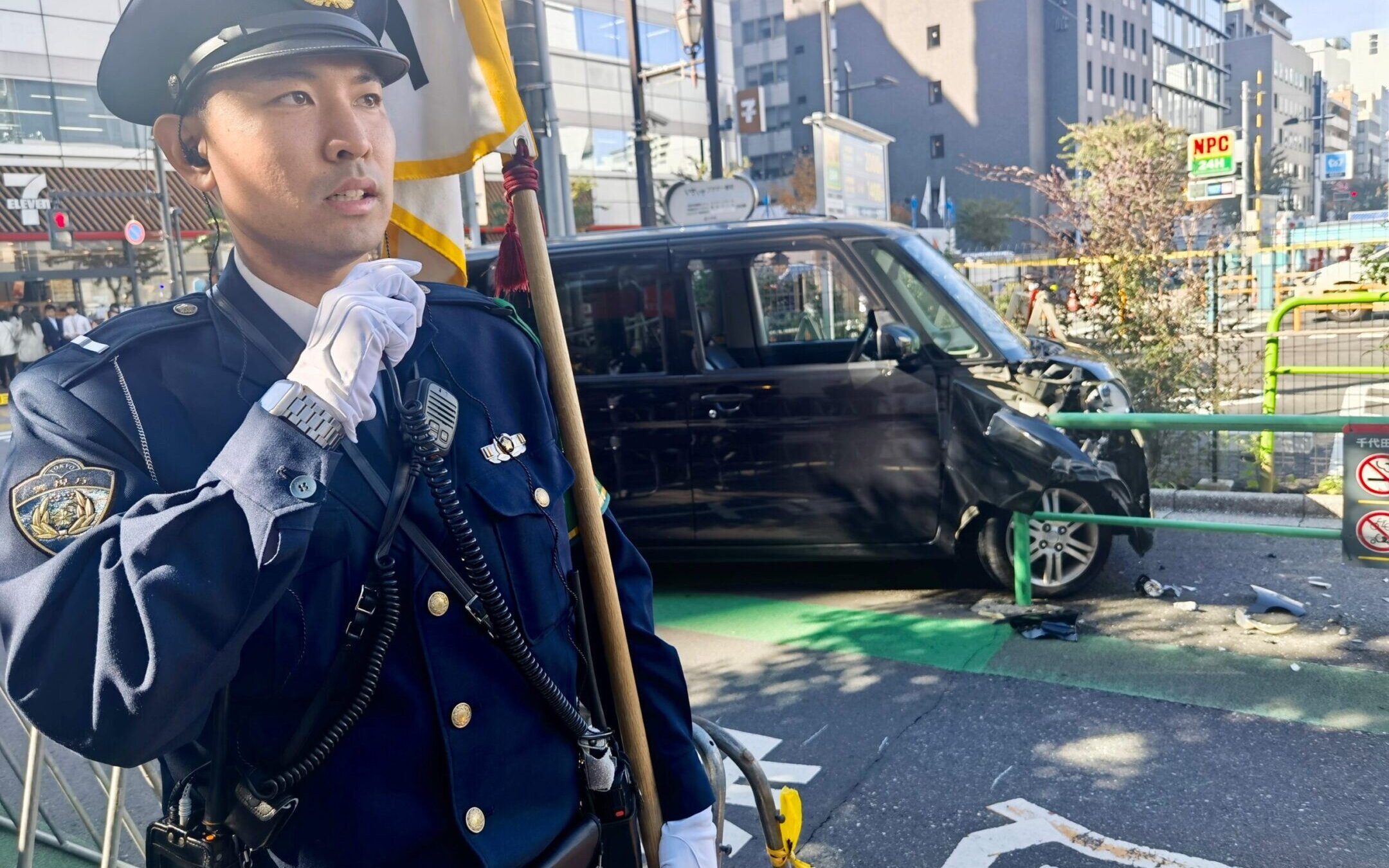 A police officer on duty at the scene of a car crash near the Israeli Embassy in Tokyo, Japan, Nov. 16, 2023. ( Zhong Ya/Xinhua via Getty Images)