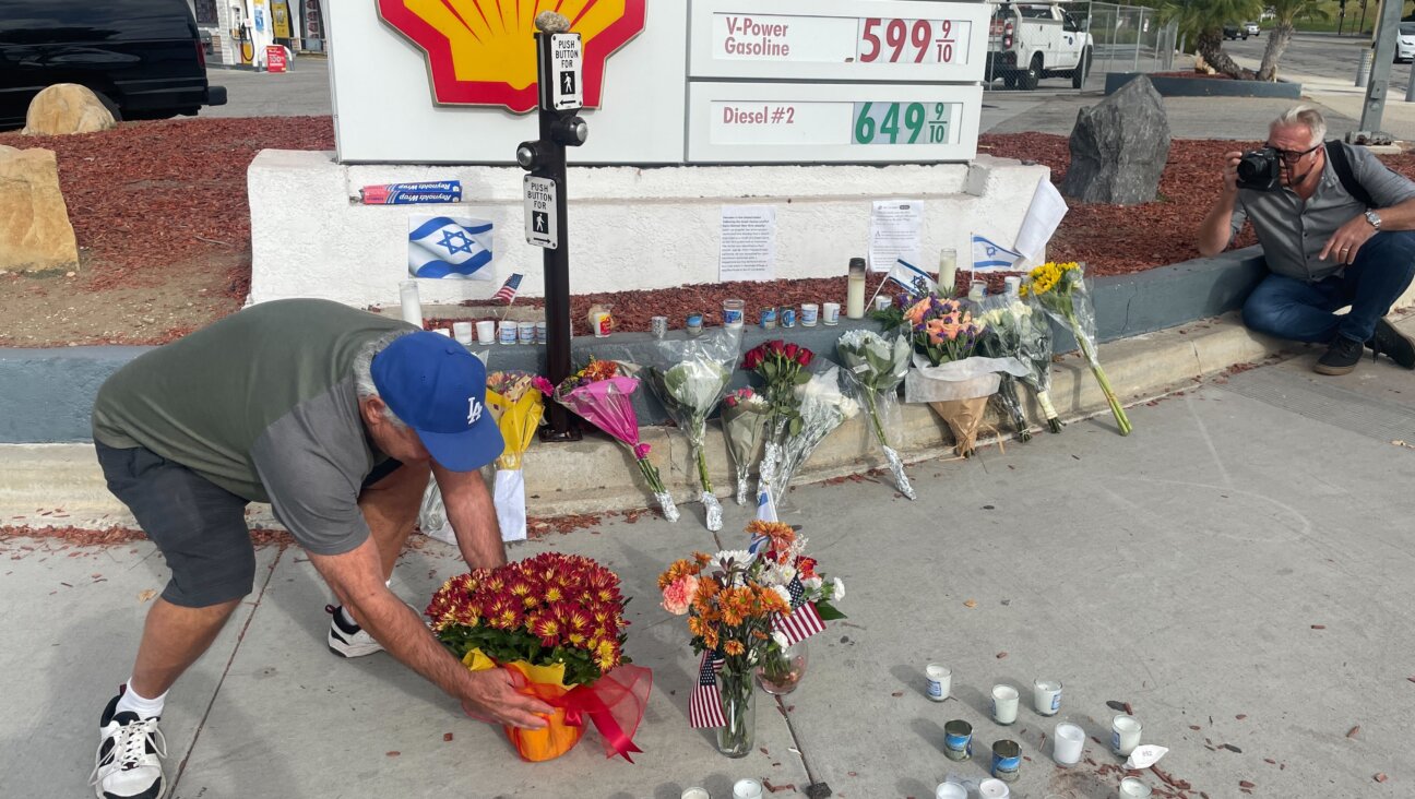 Gary Gerber, 72, on Nov. 7, 2023, brought flowers to a temporary memorial for Paul Kessler that was set up at the site of his injury.