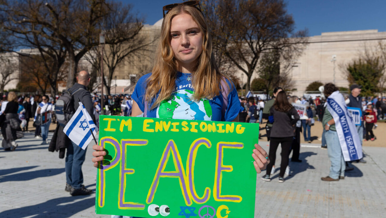 Sabrina Rubenstein, a recent Tulane University graduate, holds a sign at the March for Israel in Washington, D.C. on November 14, 2023.