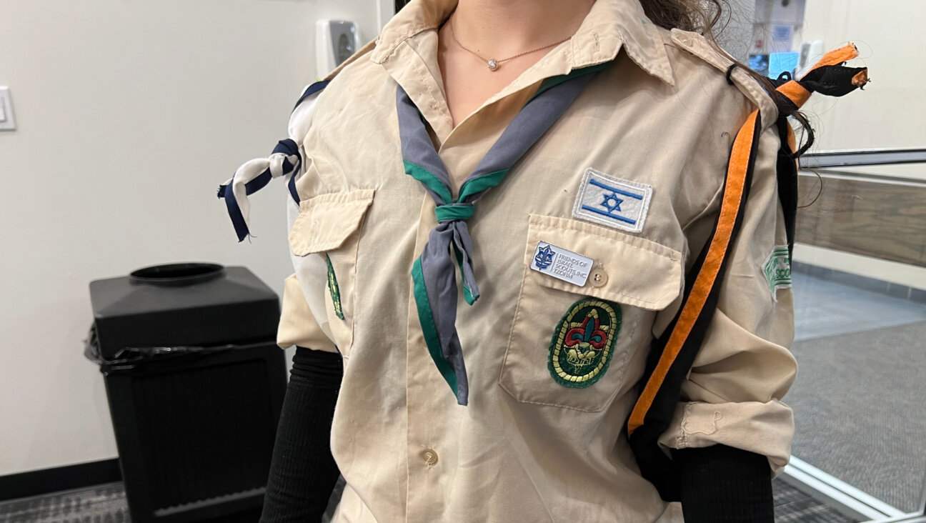 A girl on Long Island wears the uniform of the Tzofim, the Israeli-American scouting program, which has 26 chapters across the U.S. and Canada. Families who participated in this story spoke and were photographed on condition of anonymity, for fear of reprisals from those hostile to Israel.