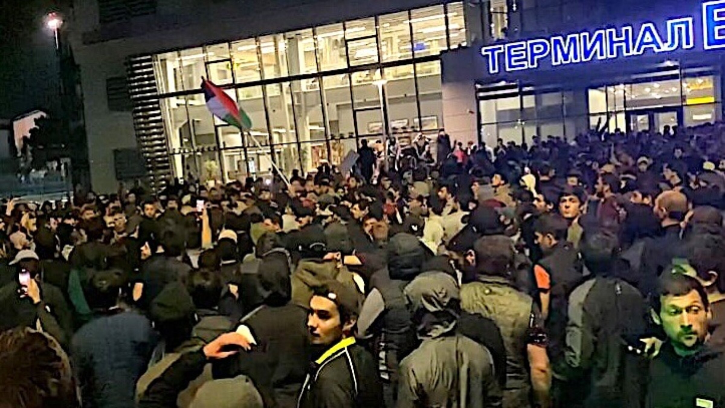 Rioters near the Dagestan airport terminal.