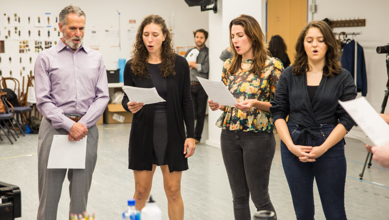 At a recent rehearsal of the new musical <i>Amid Falling Walls</i>, opening on Nov. 14.
