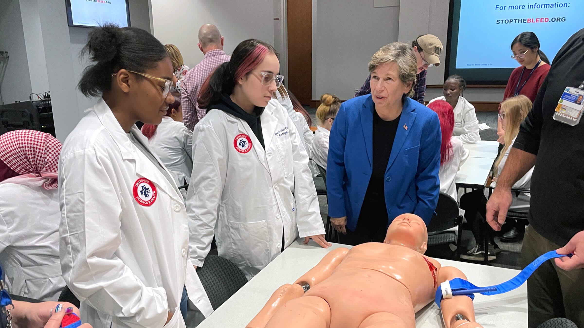 Weingarten, right, with students at Lincoln-West School of Science and Health at MetroHealth hospital in Cleveland on Oct. 24.