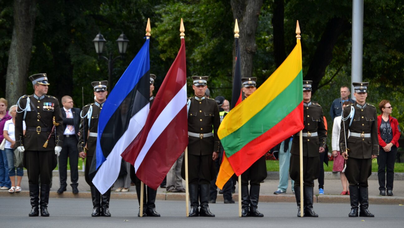 The flags, from left to right, of Estonia, Latvia and Lithuania at a ceremony in Riga, Latvia, in 2012. 