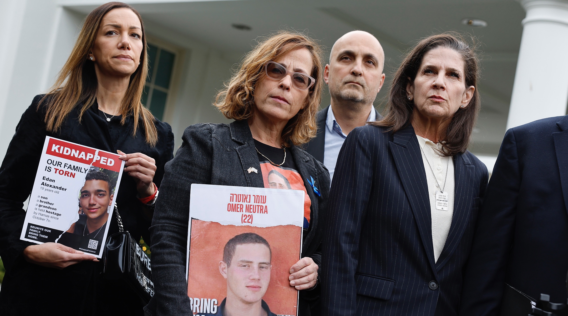 Family members of Americans who were taken hostage by Hamas during the terrorist attacks in Israel on Oct. 7, including, left to right, Yael Alexander, Orna Neutra, Adi Alexander and Liz Naftali talk to reporters outside the West Wing of the White House, Dec. 13, 2023. (Chip Somodevilla/Getty Images)