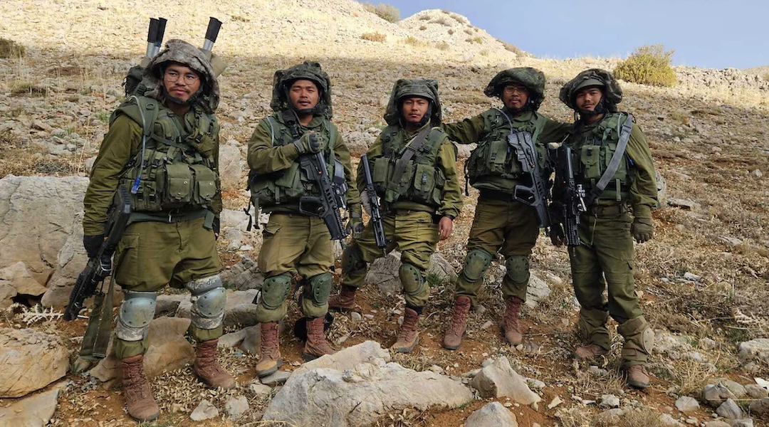 An estimated 200 young Bnei Menashe men have joined the Israeli military’s war effort. (Courtesy of Degel Menashe)